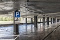 Parking for the disabled. Underground parking is located under the residential building. A place for parking and storage of Royalty Free Stock Photo