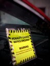 Parking fine ticket on car window