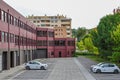 Parking in front of the Leiria City Hall, with parked vehicles, and a park in the background Royalty Free Stock Photo