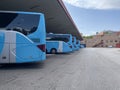 parking garage of a bus station with a group of blue buses parked in a battery Royalty Free Stock Photo