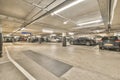 a parking garage with cars parked in it Royalty Free Stock Photo