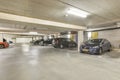 a parking garage with cars parked in it Royalty Free Stock Photo