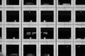 Parking garage exterior grid with abstract repeating pattern in black and white. Charlotte, North Carolina, USA