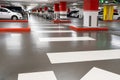 Parking garage - interior shot of multi-story car park, underground parking with cars. Parking garage underground Royalty Free Stock Photo