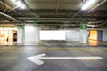 Parking garage underground interior with blank billboard.Empty space car park interior at night. Royalty Free Stock Photo