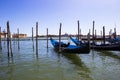 Parking gondolas on the pier in Grand Canal Royalty Free Stock Photo