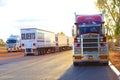 Parking heavy freight trailers, road trains in Australia Royalty Free Stock Photo