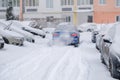 Parking in heavy snowfall. A car covered in snow. Snowstorm Royalty Free Stock Photo