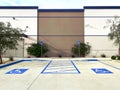 parking lot commercial disable car park space disabled handicap designated sign posted building entrance Royalty Free Stock Photo