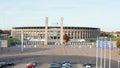 Parking lot in front of Stadium in Berlin, Germany, Aerial Wide Shot Dolly forward establisher