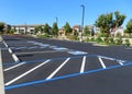 Parking lot with handicapped spaces, freshly resurfaced and painted Royalty Free Stock Photo