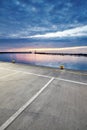 Parking lot in a harbor during the blue hour