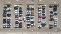 Parking lot with many cars aerial top drone view from above, city transportation Royalty Free Stock Photo