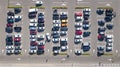 Parking lot with many cars aerial top drone view from above, city transportation Royalty Free Stock Photo