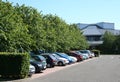 Parking lot and office building Royalty Free Stock Photo