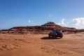 Parking lot at Pot Alley formation in Western Australia in Kalbarri National Park with red SUV car of tourists visiting this place