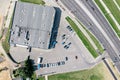 Parking lot with rows of parked cars. shopping mall, aerial view Royalty Free Stock Photo