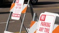 Parking lot sign as symbol of traffic difficulties and transportation issues in busy urban areas of USA. Public paid parking zone