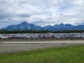 Parking lot of the state fair with the Chugach Mountains in the background in Palmer, Alaska, USA.