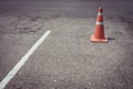 Parking lot with traffic cone on street used warning sign Royalty Free Stock Photo