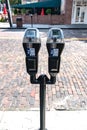 Parking machine in the city street. Parking system with payment by coins and bank cards