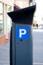 Parking meter in the big city street Royalty Free Stock Photo