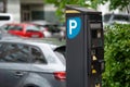 Parking meter on city street, space for text. Modern device Royalty Free Stock Photo