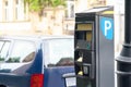 Parking meter on city street, space for text. Modern device Royalty Free Stock Photo