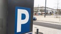 parking meter sign blue white p car parked in city street Royalty Free Stock Photo