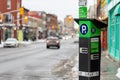 Parking meter on the street of Ottawa city, Canada. Pay by phone available Royalty Free Stock Photo