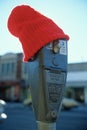 Parking meter wearing a red wool cap, St. Louis, MO