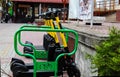 Parking of modern electric scooters on city streets.