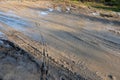 parking near the potholes that are on the dirt road. Royalty Free Stock Photo