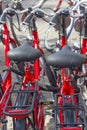 Parking of the new red bicycles in Amsterdam, Europe Royalty Free Stock Photo