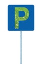 Parking place road sign on post pole, traffic roadsign, blue, P signage abstract green leaf closeup with raindrops, isolated Royalty Free Stock Photo