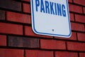 Parking Sign on Brick Wall