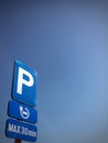 Parking sign electrical vehicle charging station