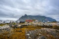 Parking in a small town in the Lofoten Islands The sky is cloudy like it is about to rain. Henningsvaer Royalty Free Stock Photo