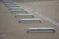 Parking stop and boundary for parking trucks at the unloading ramp of the warehouse door. a galvanized pipe anchored to the ground