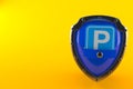 Parking symbol inside shield