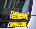 A penalty Parking Ticket on a car