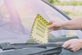 Parking ticket placed under windshield Royalty Free Stock Photo