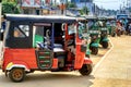 Parking tuk-tuks a small three-wheeled taxi on the street Kalpiti