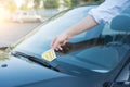 Parking violation ticket fine on windshield Royalty Free Stock Photo