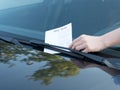 Parking violation ticket fine on windshield Royalty Free Stock Photo