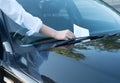 Parking violation ticket fine on windshield Royalty Free Stock Photo