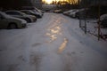 Parking in winter. Cars in parking lot in yard. Frozen road in city. Morning in parking lot Royalty Free Stock Photo