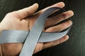 Parkinson`s Day Men`s Hand with gray tape