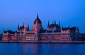 The Parliament in Budapest by the Danube. white stone facade at blue hour Royalty Free Stock Photo