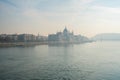 Parliament building and Danube river in the foggy morning, Budapest, Hungary